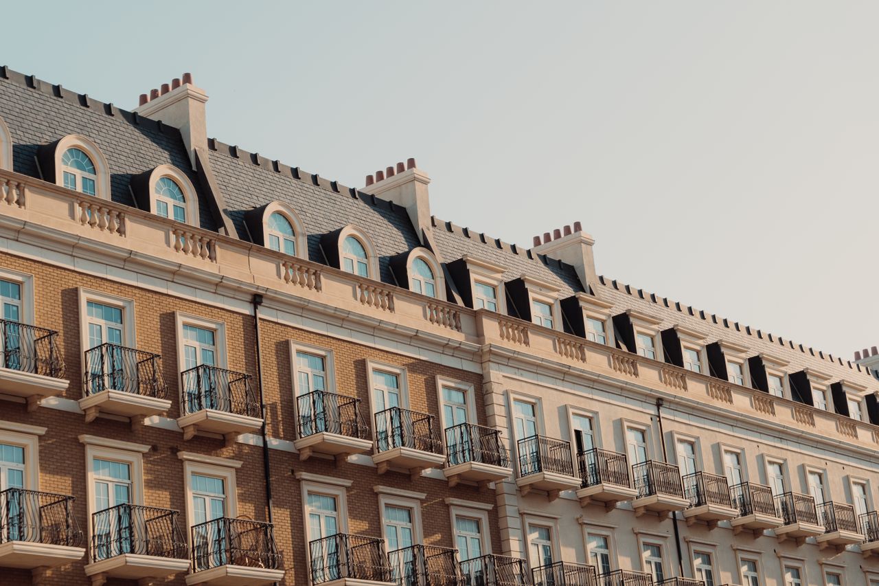 Capture of a modern residential building in Baku showcasing classic architectural style.